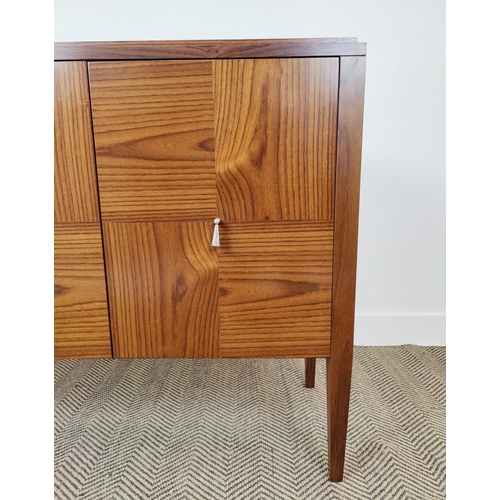 398 - SIDEBOARD, with three doors and parquetry detail, 130cm W x 40cm D x 84cm H.