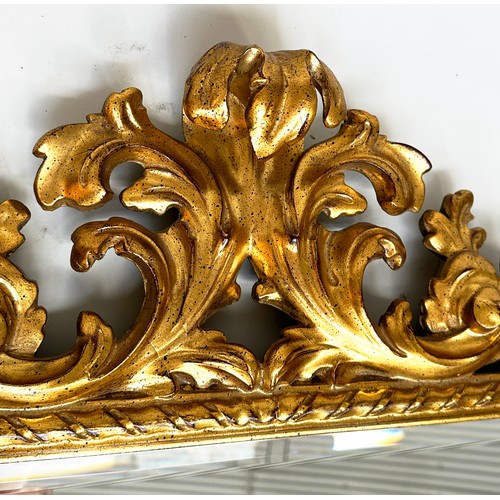 180 - WALL MIRROR, Italian 19th century Florentine carved giltwood with rectangular foliate and pierced fr... 