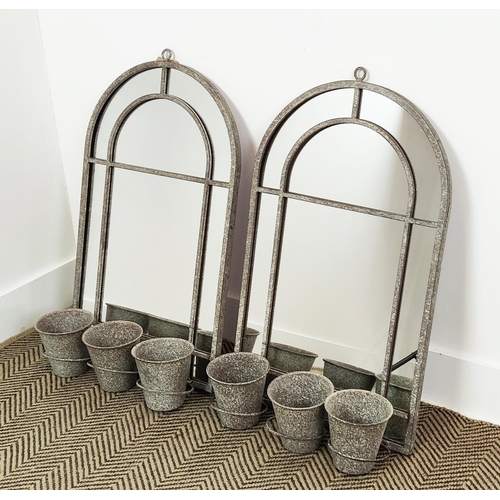 372 - GARDEN MIRRORS, a pair, metal arched frames, each with three plant pot holders, 90cm H x 45cm W. (2)