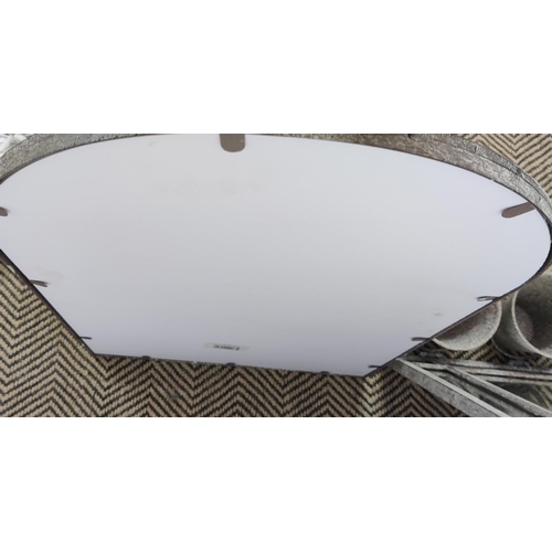 372 - GARDEN MIRRORS, a pair, metal arched frames, each with three plant pot holders, 90cm H x 45cm W. (2)