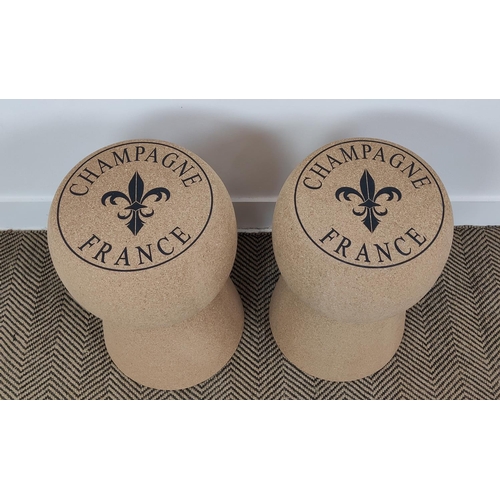 385 - CHAMPAGNE CORK FORM STOOLS, a pair, 53cm H x 34cm W. (2)