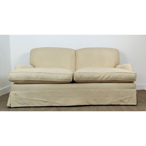 418 - SOFA, Howard style in cream fabric on beech legs and castors, 90cm H x 184cm W x 107cm D.