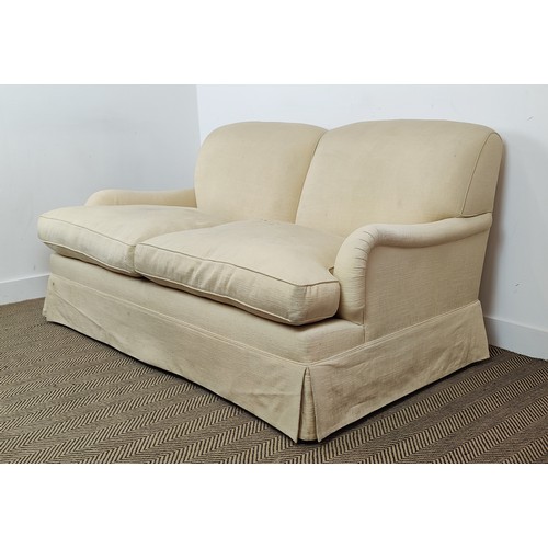 418 - SOFA, Howard style in cream fabric on beech legs and castors, 90cm H x 184cm W x 107cm D.