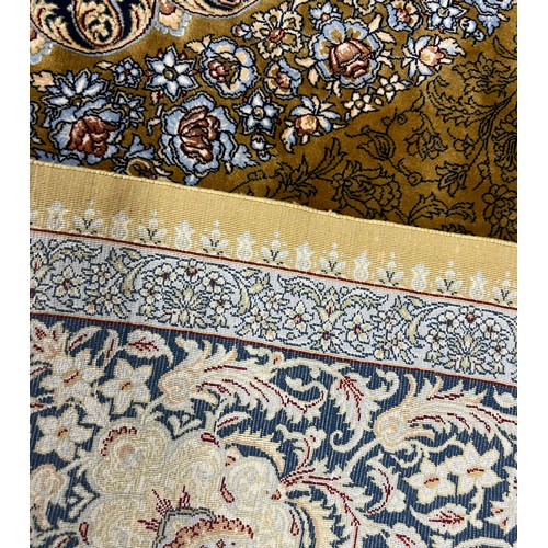 131A - FINE SILK QUM DESIGN RUG.