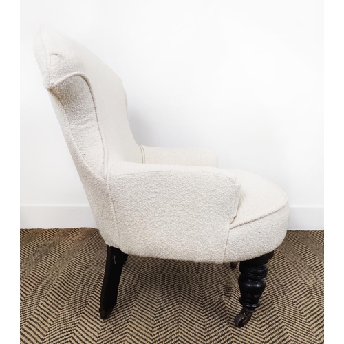 145 - ***WITHDRAWN*** - ARMCHAIR, Victorian black painted with boucle wool upholstery and ceramic castors,... 