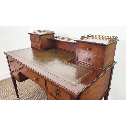 148 - DESK, Edwardian mahogany, circa 1905, with brass gallery, green leather top and nine drawers on cast... 