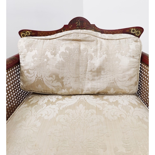 164 - BERGERE, early 20th century scarlet and gilt chinoiserie decorated and caned with damask cushions, 8... 