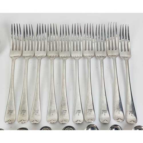 10 - A PART CANTEEN OF STERLING SILVER CUTLERY, London 1921, comprising ten dinner forks, ten table spoon... 