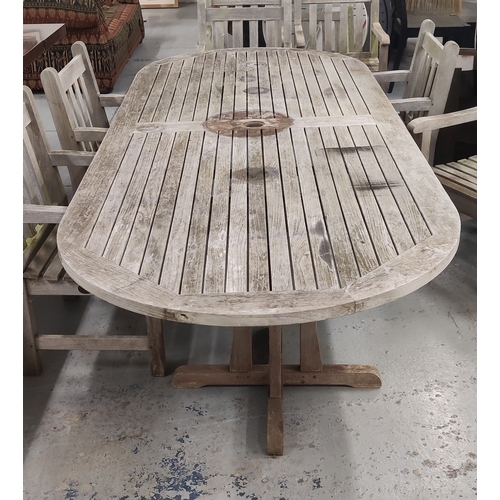 118 - GARDEN TABLE, weathered teak, 70cm H x 108cm W x 270cm L, and a set of eight armchairs, by Barlow Ty... 