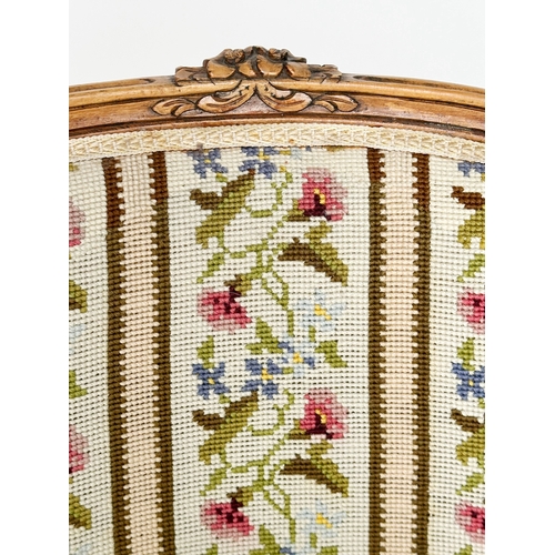 127 - FAUTEUIL, French Louis XV style walnut with floral and striped needlework, panel upholstery, 62cm W.