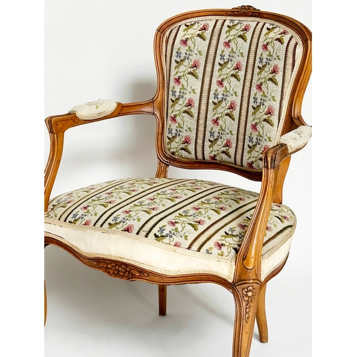 127 - FAUTEUIL, French Louis XV style walnut with floral and striped needlework, panel upholstery, 62cm W.