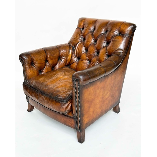 129 - LIBRARY ARMCHAIR, vintage club style with hand finished antique studded tan leather upholstery with ... 