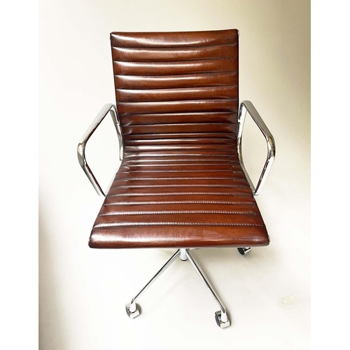 132 - AFTER CHARLES AND RAY EAMES ALUMINIUM GROUP STYLE ARMCHAIR, with ribbed hand finished soft tan leath... 