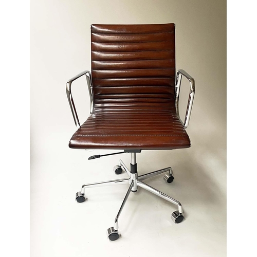 132 - AFTER CHARLES AND RAY EAMES ALUMINIUM GROUP STYLE ARMCHAIR, with ribbed hand finished soft tan leath... 