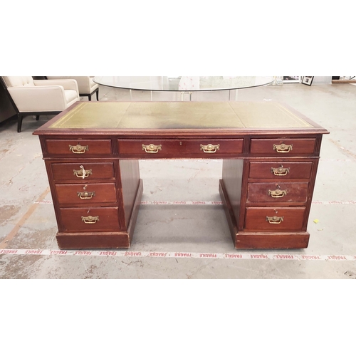 135 - PEDESTAL DESK, Edwardian mahogany with green leather top above nine drawers on castors, 76cm H x 153... 