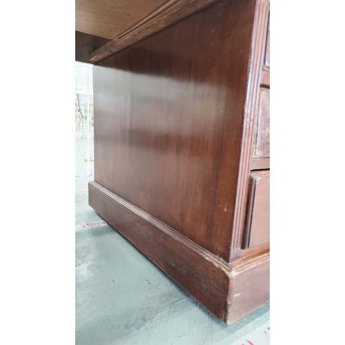 135 - PEDESTAL DESK, Edwardian mahogany with green leather top above nine drawers on castors, 76cm H x 153... 