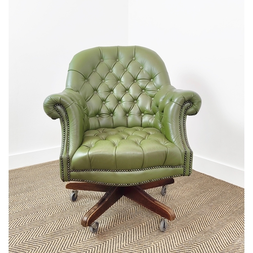 136 - DESK CHAIR, green leather with swivel seat on castors, 95cm H x 82cm W.