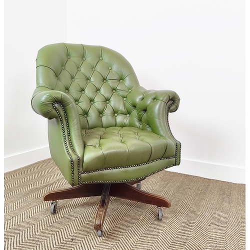 136 - DESK CHAIR, green leather with swivel seat on castors, 95cm H x 82cm W.