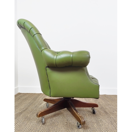 136 - DESK CHAIR, green leather with swivel seat on castors, 95cm H x 82cm W.