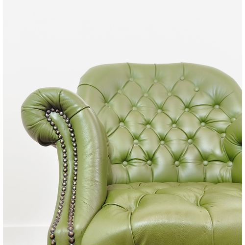 136 - DESK CHAIR, green leather with swivel seat on castors, 95cm H x 82cm W.