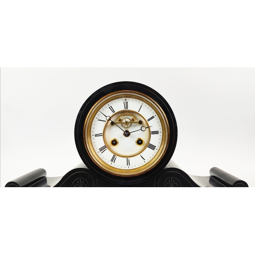 16 - A LATE 19TH CENTURY BLACK SLATE MANTEL CLOCK, eight day movement, white enamelled dial with black Ro... 