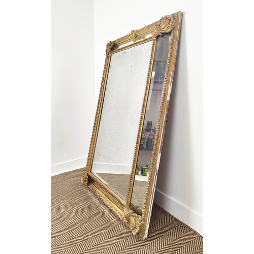 173 - WALL MIRROR, 19th century French giltwood and gesso with gadrooned cushion frame, 155cm x 101cm.