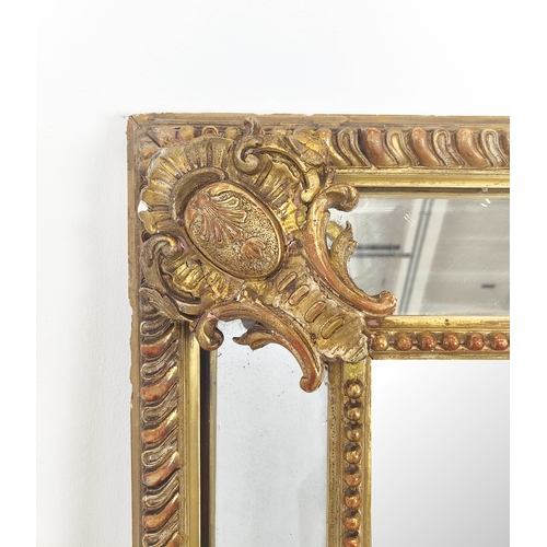 173 - WALL MIRROR, 19th century French giltwood and gesso with gadrooned cushion frame, 155cm x 101cm.