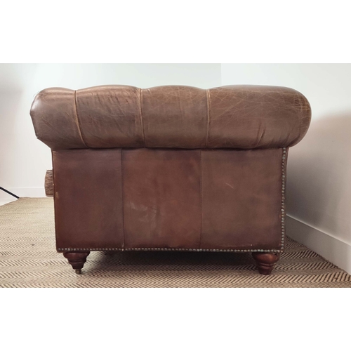 176 - CHESTERFIELD SOFA, brown leather on front castors, 73cm H x 223cm W x 100cm D.