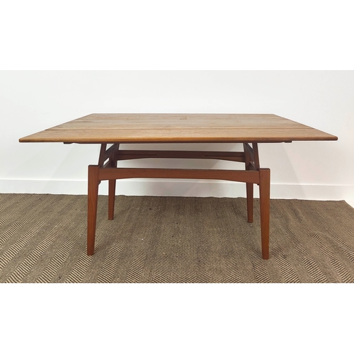 180 - METAMORPHIC ELEVATOR DINING/LOW TABLE, circa 1970, Danish teak, with height adjustable drawleaf top,... 