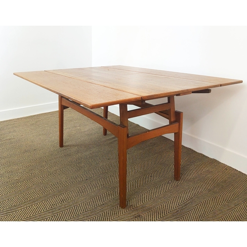 180 - METAMORPHIC ELEVATOR DINING/LOW TABLE, circa 1970, Danish teak, with height adjustable drawleaf top,... 