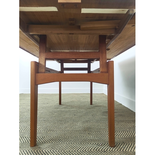 180 - METAMORPHIC ELEVATOR DINING/LOW TABLE, circa 1970, Danish teak, with height adjustable drawleaf top,... 