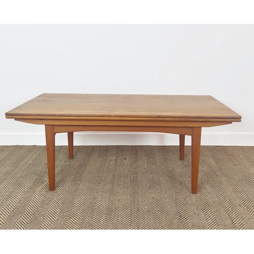 180 - METAMORPHIC ELEVATOR DINING/LOW TABLE, circa 1970, Danish teak, with height adjustable drawleaf top,... 