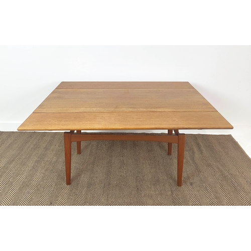 180 - METAMORPHIC ELEVATOR DINING/LOW TABLE, circa 1970, Danish teak, with height adjustable drawleaf top,... 