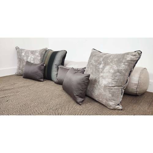 320 - CUSHIONS, seven of various shades, sizes and descriptions, 185cm x 28cm at largest approx. (7)