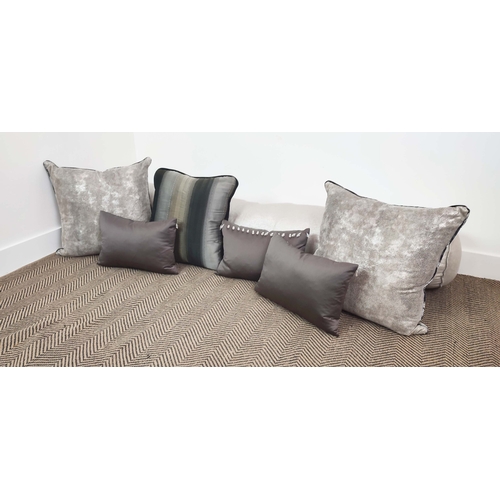 320 - CUSHIONS, seven of various shades, sizes and descriptions, 185cm x 28cm at largest approx. (7)