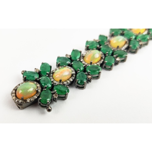 19 - A LARGE EMERALD, OPAL AND DIAMOND SET BRACELET, set with oval opals, emeralds, and round brilliant c... 