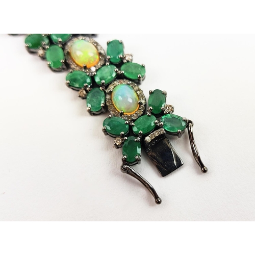 19 - A LARGE EMERALD, OPAL AND DIAMOND SET BRACELET, set with oval opals, emeralds, and round brilliant c... 