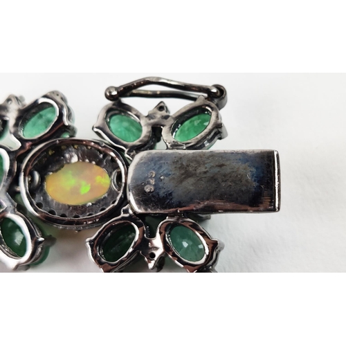 19 - A LARGE EMERALD, OPAL AND DIAMOND SET BRACELET, set with oval opals, emeralds, and round brilliant c... 