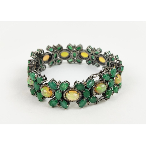 19 - A LARGE EMERALD, OPAL AND DIAMOND SET BRACELET, set with oval opals, emeralds, and round brilliant c... 