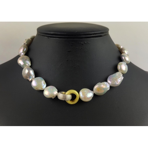 21 - A BAROQUE FRESHWATER PEARL NECKLACE, with brushed gold plated hoop clasp, 44cm / 17.5 inches long.