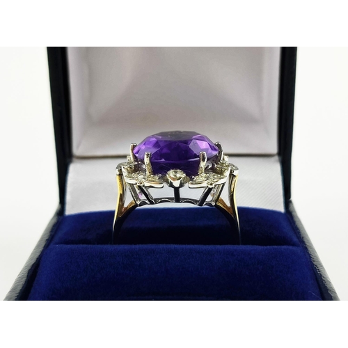 22 - AN AMETHYST AND DIAMOND DRESS RING, 9ct yellow gold shank, white gold mount, the large central mixed... 