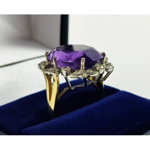 22 - AN AMETHYST AND DIAMOND DRESS RING, 9ct yellow gold shank, white gold mount, the large central mixed... 