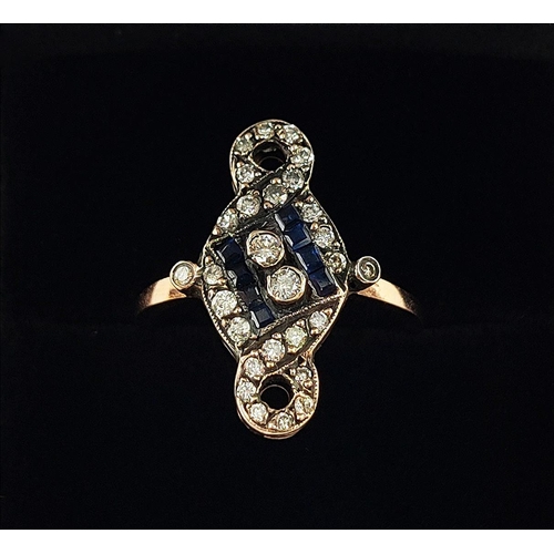 29 - AN ART NOUVEAU STYLE DRESS RING, rose gold coloured metal, set with diamonds and sapphires, ring siz... 