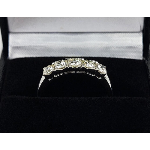 30 - AN 18CT WHITE GOLD FIVE STONE DIAMOND RING, set with round brilliant cut diamonds, total carat weigh... 