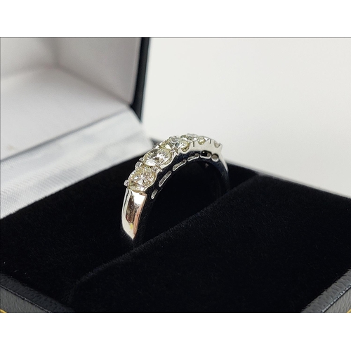 30 - AN 18CT WHITE GOLD FIVE STONE DIAMOND RING, set with round brilliant cut diamonds, total carat weigh... 