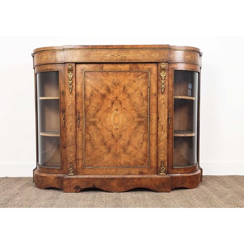 133 - CREDENZA, mid Victorian burr walnut, inlaid and gilt metal mounted with bowed glazed doors and velve... 