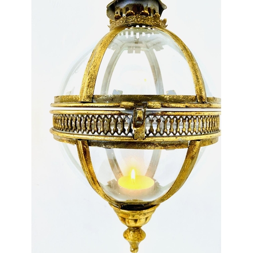 322 - WALL HANGING GLOBE LANTERNS, a pair, Regency style gilt metal and glass, 80cm H x 25cm W x 25cm D. (... 