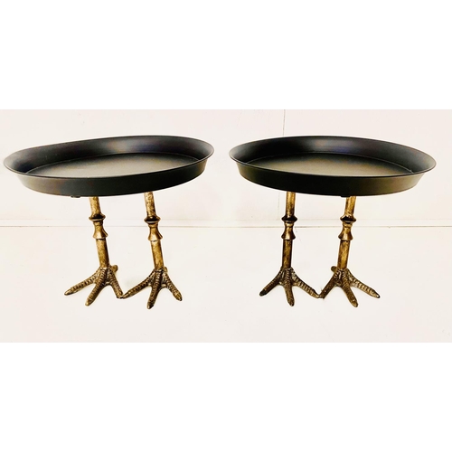 326 - TAZZAS, a pair, black metal dishes on gilt birds feet supports, 31cm H x 41cm W x 41cm D. (2)