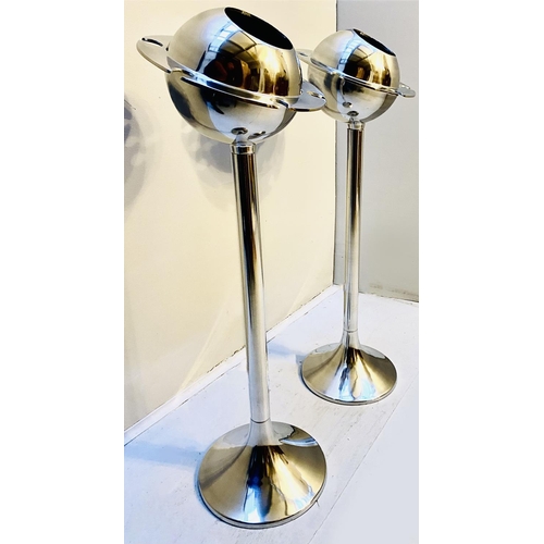 331 - WINE COOLERS ON STANDS, a pair, Art Deco style polished metal. (2)