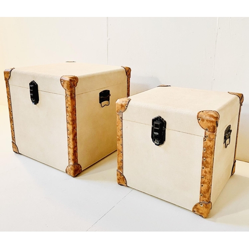 332 - TRUNKS, graduated set of two, canvas and leather, largest 50cm H x 50cm W x 50cm D. (2)